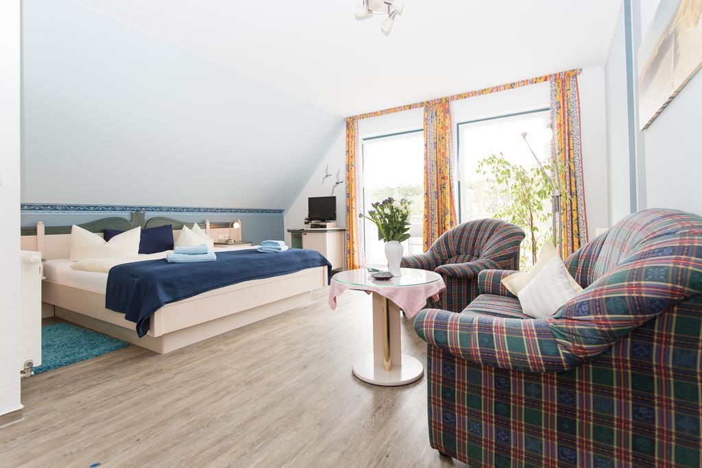 Hotel Garni Am Deich Zingst Pokoj fotografie